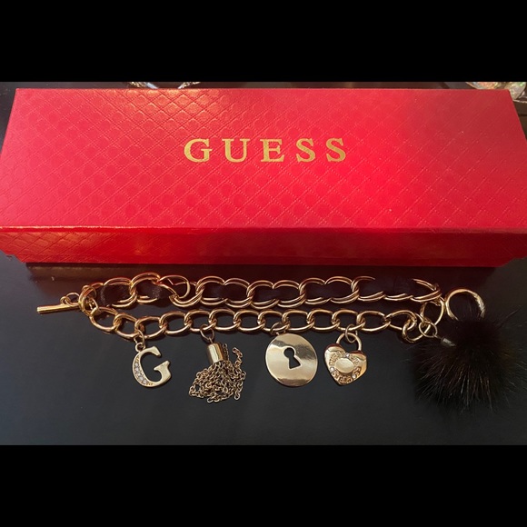 New GUESS gold tone layered charm bracelet